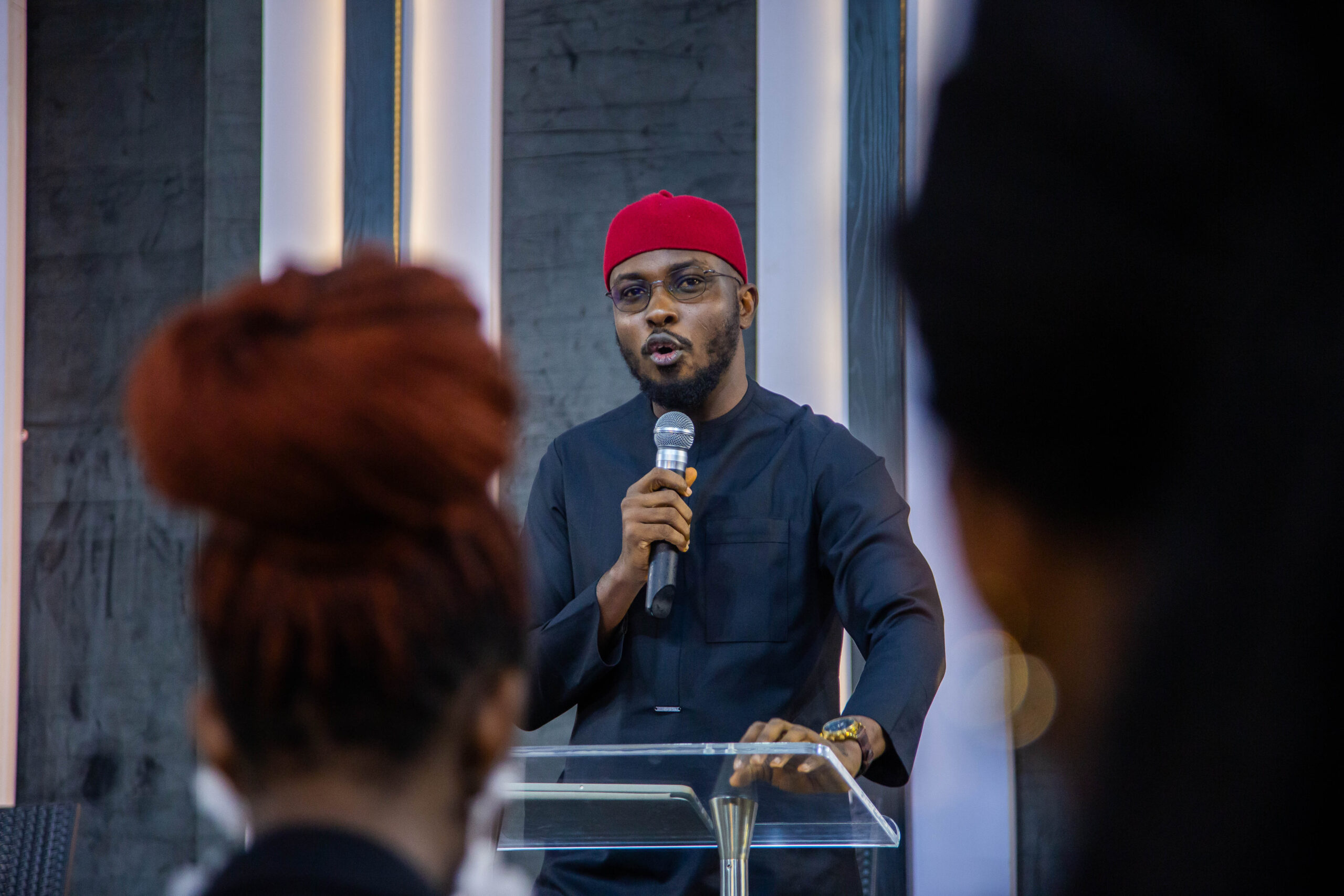 Joel Amawhe speaking at an event in Abuja